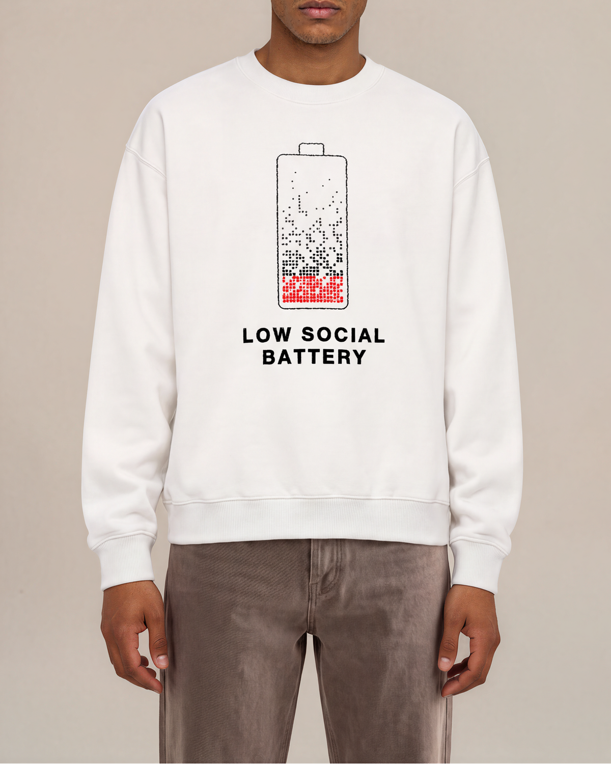 Low Social Battery Unisex Crewneck — White crewneck on a model, printed front