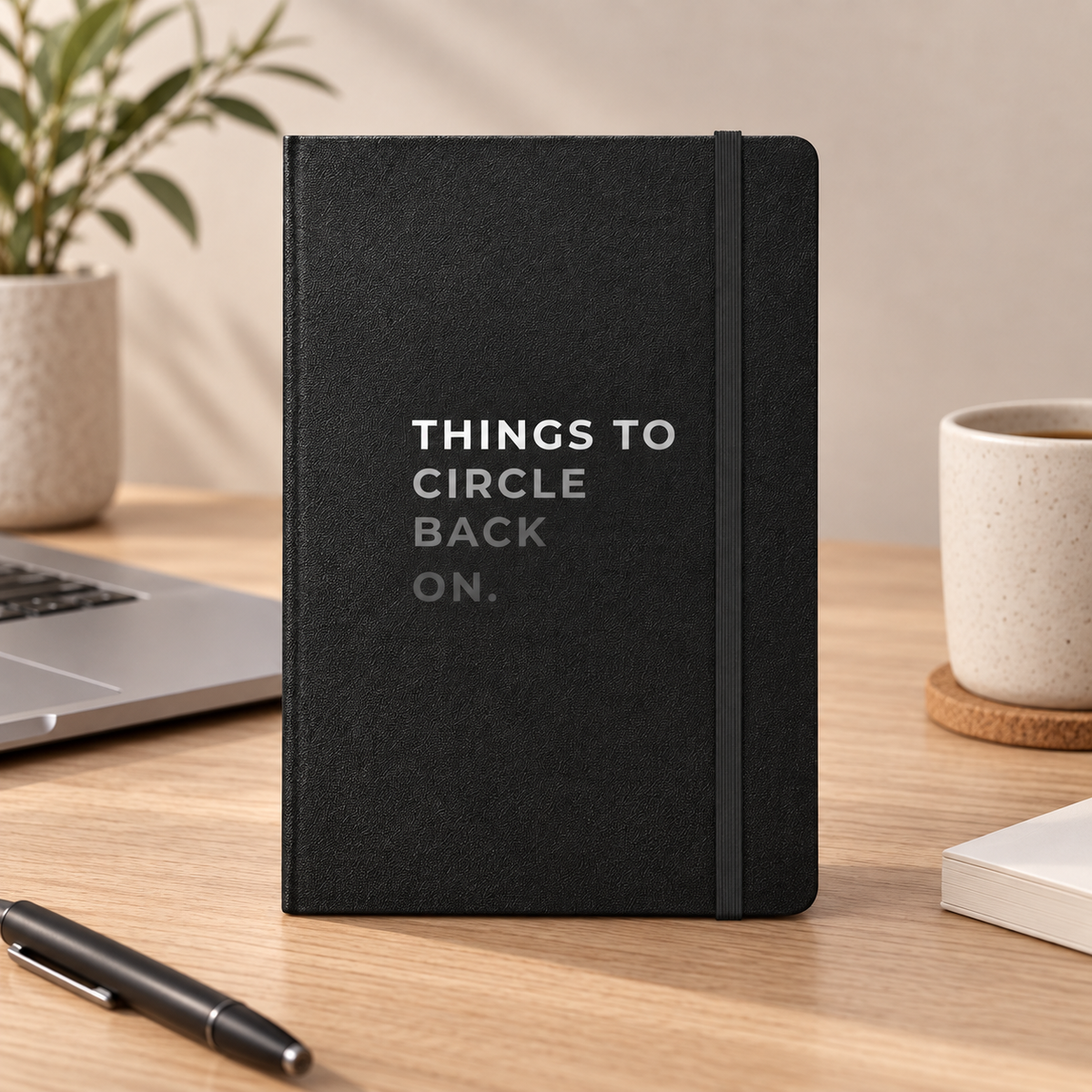 Things to Circle Back On Hardcover Notebook — on a desk